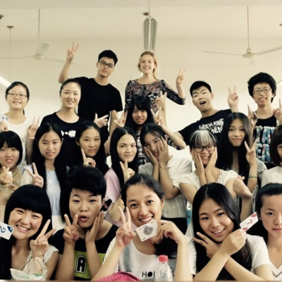 Group of university English students in China with their English teacher